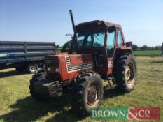 1984 Fiat 880DT 5 4wd tractor with front wafer weights on 340/85R24 front and 420/85R34 rear wheels