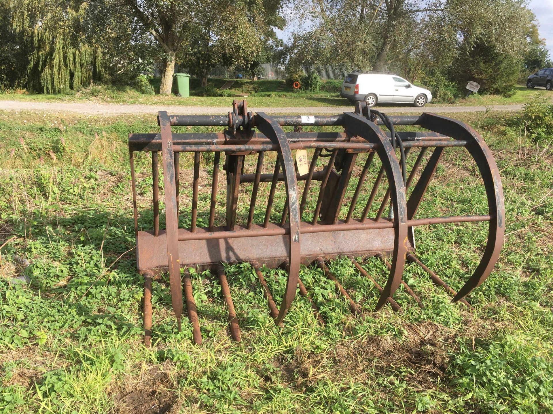 Strimech muck grab Manitou brackets