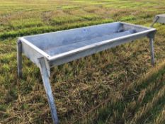 Metal feed trough