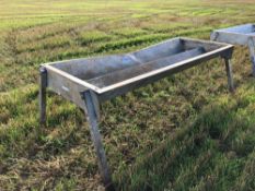 Metal feed trough