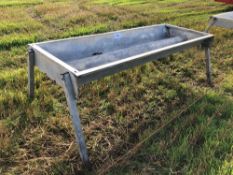 Metal feed trough