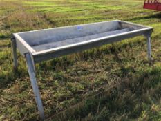 Metal feed trough