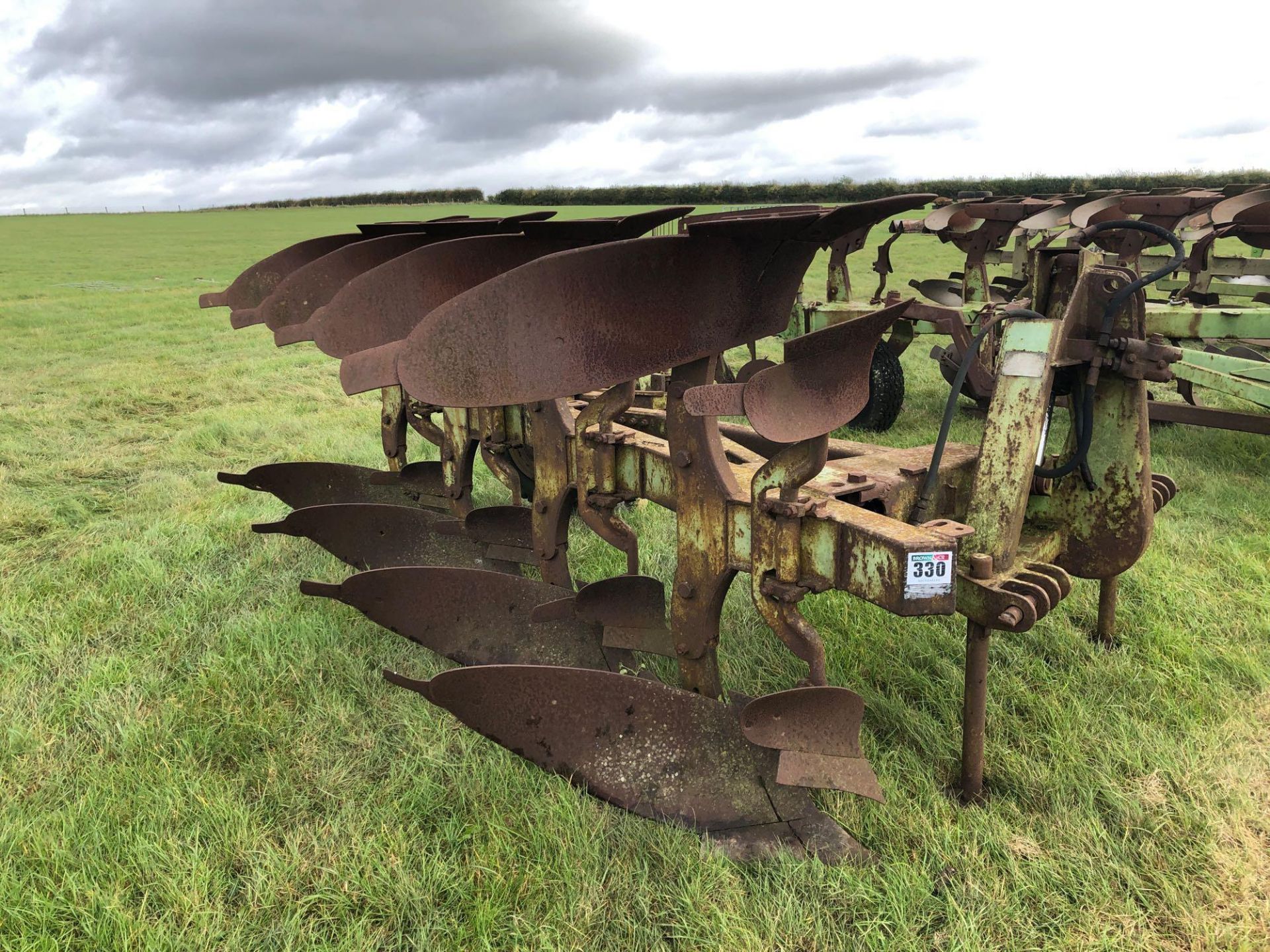 Dowdeswell DP1 4 furrow reversible crawler plough. Serial No: 40816.