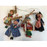 Four Pelham puppets, Gretel, a King, a Witch, an old woman and a caterpillar (5)