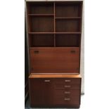 A Grange mid-century three part shelf and cupboard system, 92cmW