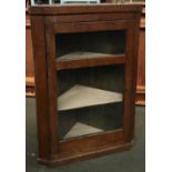 A glazed oak corner cupboard, 97cmH