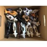 A large collection of English and continental ceramic cow creamers, including Guernsey, Jersey,