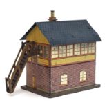 A tinplate railway signal box with staircase and lead chimney, 11cmH