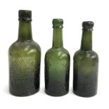 Three green glass bottles; T. Macfarlane & Sons ltd, Weston Supermare; Arthur C Culley & Co.