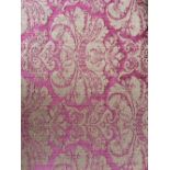 A roll of damask fabric
