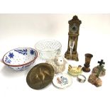 A mixed lot to include a brass peacock plaque, a glass bowl, a ceramic chicken lidded pot, a