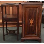 An Edwardian mahogany bedside cabinet with satin wood banding, door with central urn and swag