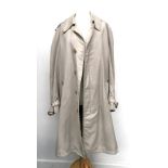 A gent's single breasted Aquascutum raincoat, approximately 38-40" chest