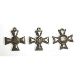 A WWI Imperial Russian Cross of St. George, 3rd Class, numbered 305 604, together with two other