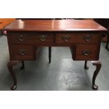 A 20th century lowboy, four drawers on cabriole legs, 106cmW