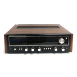 A Pioneer stereo receiver model SX-5530 in teak