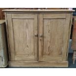 A pine sideboard/cupboard with two shelves, 92cmW