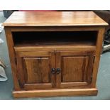 A teak cabinet, undershelf above cupboard doors, 85cmW