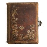 A Victorian musical photo album 'The Seasons', leather bound with embossed floral cover design