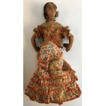 A vintage Spanish flamenco doll, composition body with hand painted detail and stencilled fishnet