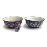 A pair of Chinese enamel bowls, 12cmD, together with a small ceramic bottle stop