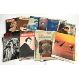 A collection of programmes and sheet music, to include Elton John and Ray Cooper At the Rainbow