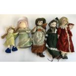 Three porcelain dolls and three rag dolls