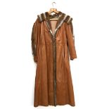 A Grunstein long maxi leather coat with panels of soft multicoloured fur, a fur trimmed hood,