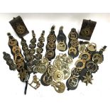 A large quantity of horse brasses, many mounted