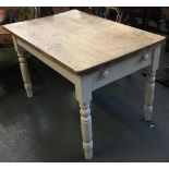 A solid pine kitchen table, on painted base, single end drawer, on turned legs, 114x77x76cmH