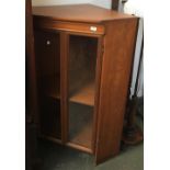 A glazed teak cabinet, 100cmW