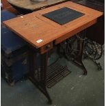 A Singer sewing machine table with machine, 79cmW
