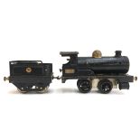 An early Hornby O gauge clockwork loco no. 2710, c.1920, with tender (af)