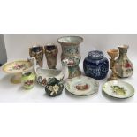 A mixed lot of vases and ceramics to include an oriental drum vase and a blue and white ginger jar