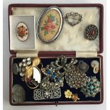 Mixed lot of brooches to include a silver heart set with white stones, Victorian brooch set with
