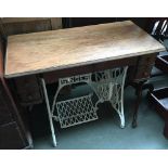 A white painted Singer sewing machine table (converted)