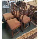 Four solid oak splat back chairs