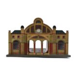 An O gauge tinplated continental style train station by Gebruder Bing, 20cmH