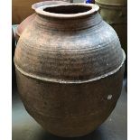 A large terracotta garden urn, 70cmH