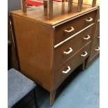 A G-Plan chest of three drawers, the upper drawer with two internal divisions, 77cmW