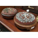 A pair of circular 19th century embroidered foot stools