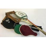 A quantity of vintage tennis and squash rackets with stretchers; together with ping pong and