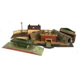 A quantity of model railway wooden buildings and tunnels