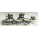A Wedgwood 'Florentine' part tea service to unclude teacups (5), saucers (6), small plates (6), cake