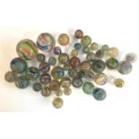 A large lot of 46 19th century marbles of various sizes (af), to include latticinio core swirls (