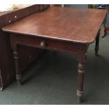 A 19th century oak kitchen table, drawers to either end, on turned legs, 135x98x76cmH