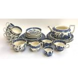 A Wedgwood willow pattern teaset to include six cups and saucers, various plates, milk jug and sugar