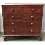 A Georgian and later mahogany chest of four graduating drawers with brushing slide, cross banded top