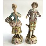 A pair of continental style figurines of a young man and woman (af), intricately hand painted with