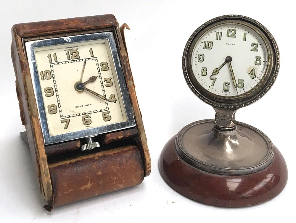 A Jaeger LeCoultre 8 day alarm clock, chrome and leather; together with an 8 day alarm clock on